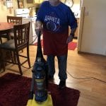 IVI client vacuuming carpet