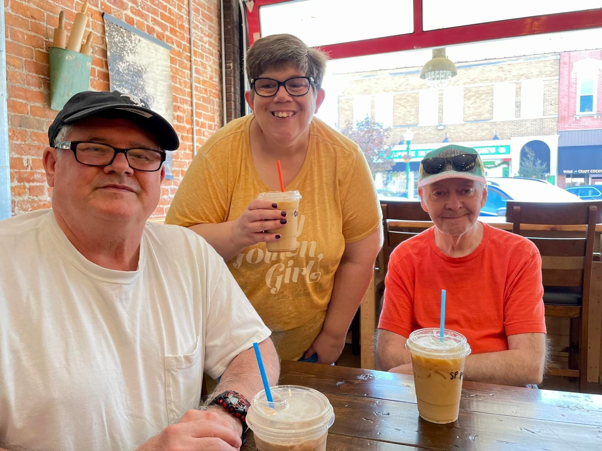 Enjoying a lovely afternoon with great company and delicious iced coffee!"